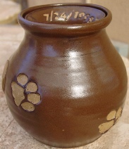 brown rust glazed paw print pet urn