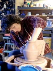 throwing pottery