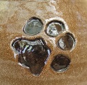 paw print tracks black and tan